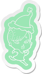 quirky cartoon  sticker of a surprised girl wearing santa hat