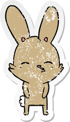 distressed sticker of a curious bunny cartoon