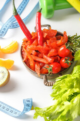 glass of carrot juice, crackers and diet food, meat snacks on a plate, dried pieces of carpaccio...