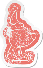 quirky cartoon distressed sticker of a crying sitting polar bear wearing santa hat