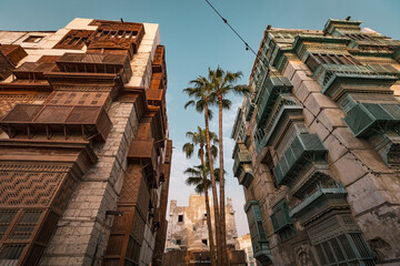 Traditional architecture of old Jeddah town El Balad district houses with wooden windows and...