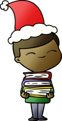 hand drawn gradient cartoon of a smiling boy with stack of books wearing santa hat