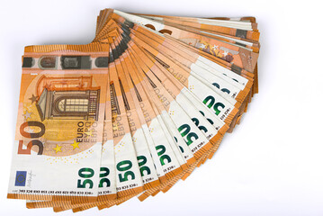 Euro banknotes close up on a white background, business and finance concept
