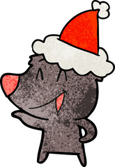 laughing bear hand drawn textured cartoon of a wearing santa hat