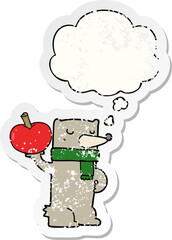 cartoon bear with apple with thought bubble as a distressed worn sticker