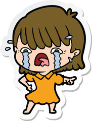 sticker of a cartoon girl crying
