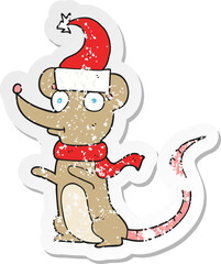 retro distressed sticker of a cartoon mouse wearing christmas hat