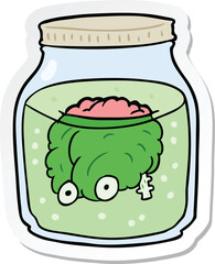 sticker of a cartoon spooky brain in jar