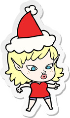 pretty hand drawn sticker cartoon of a elf girl wearing santa hat
