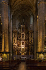 Fototapeta premium Elaborate gold altar in the 16th century San Bizente Eliza or San Vicente the Martyr Iglesia church, San Sebastian, Donostia, Basque Country, Spain
