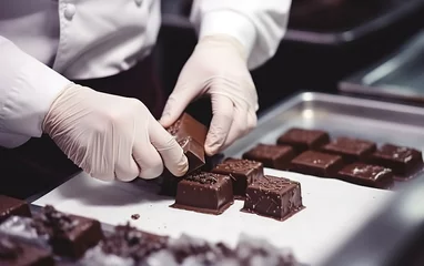 Foto op Plexiglas Close-up pastry chef in a gloves makes delicious chocolate candies © AI_images