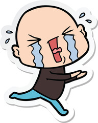 sticker of a cartoon crying bald man