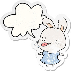 cute cartoon rabbit blowing raspberry with speech bubble distressed distressed old sticker