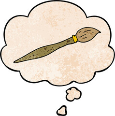 cartoon paint brush with thought bubble in grunge texture style