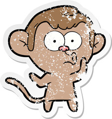 distressed sticker of a cartoon hooting monkey