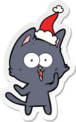 funny hand drawn sticker cartoon of a cat wearing santa hat