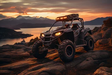 Fotobehang 2 ATV on a mountain at sunset overlooking the ocean © Vincent