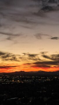 Los Angeles California winter sky sunrise time lapse in the San Fernando Valley.  Vertical view.