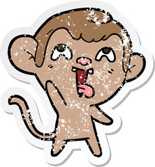 distressed sticker of a crazy cartoon monkey