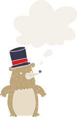 cartoon bear in top hat with thought bubble in retro style