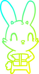 cold gradient line drawing of a cute cartoon rabbit with present