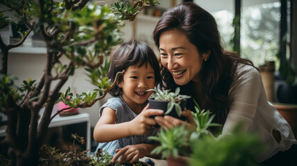 Sustainable education Asian daughter and mother cultivating plants to conserve the environment