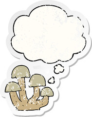 cartoon mushroom with thought bubble as a distressed worn sticker