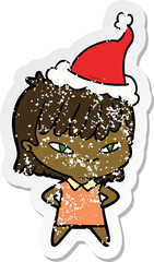 hand drawn distressed sticker cartoon of a woman wearing santa hat