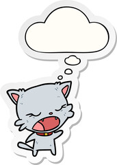 cartoon cat talking with thought bubble as a printed sticker