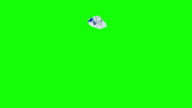 Lowercase letter g on crumpling blue piece of paper filmed against green screen in stop motion. Loop footage of small alphabet symbol of orange color printed on folded sticker on alpha channel
