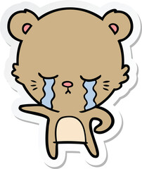 sticker of a crying cartoon bear