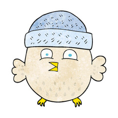 freehand textured cartoon owl wearing hat