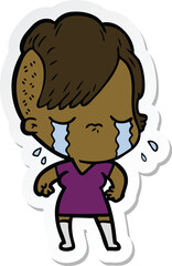 sticker of a cartoon crying girl