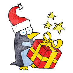 freehand drawn texture cartoon christmas penguin with present