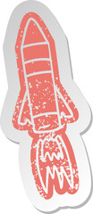 distressed old cartoon sticker of a space rocket