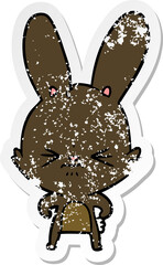 distressed sticker of a cute cartoon rabbit