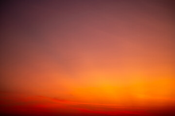 Beautiful luxury soft gradient with orange gold clouds and sunlight on the blue sky perfect for the background, take in everning,morning,Twilight, high definition landscape photo