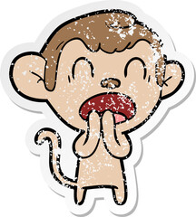 distressed sticker of a yawning cartoon monkey