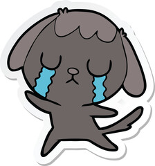 sticker of a cute cartoon dog crying