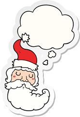 cartoon santa face with thought bubble as a printed sticker