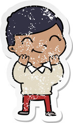 distressed sticker of a cartoon boy smiling