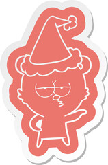 bored polar bear quirky cartoon  sticker of a wearing santa hat