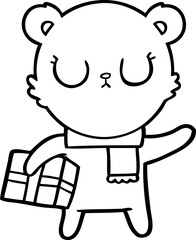 Obraz premium peaceful cartoon polar bear with christmas gift