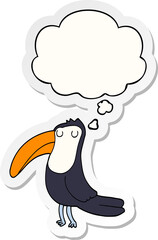 cartoon toucan with thought bubble as a printed sticker
