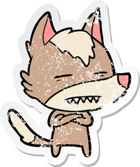 distressed sticker of a cartoon wolf showing teeth