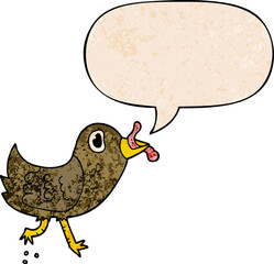 cartoon bird with worm with speech bubble in retro texture style