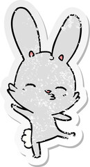 distressed sticker of a curious bunny cartoon