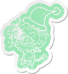 quirky cartoon distressed sticker of a roaring lion wearing santa hat