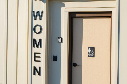 Women bathroom public space door and part of building, abstract architecture background