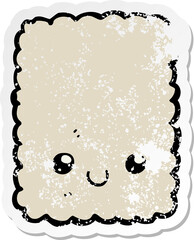 distressed sticker of a cartoon biscuit